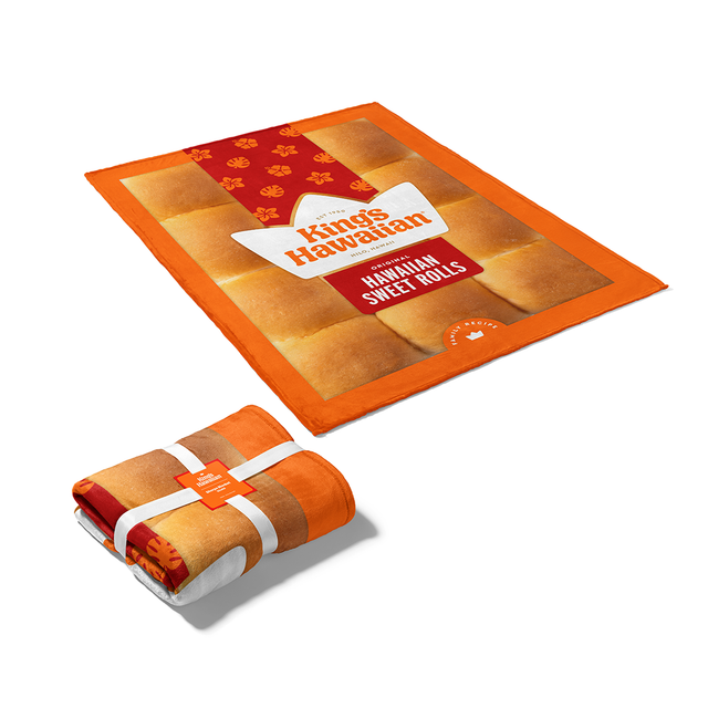 Image of King's Hawaiian Sherpa Blanket opened up next to blanket folded and wrapped