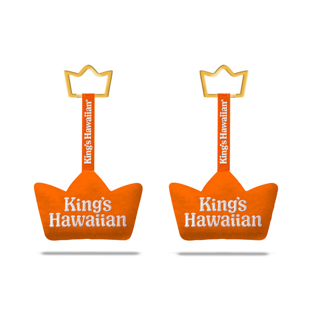 Image of different sides of the King's Hawaiian crown logo plush bag charm on white background