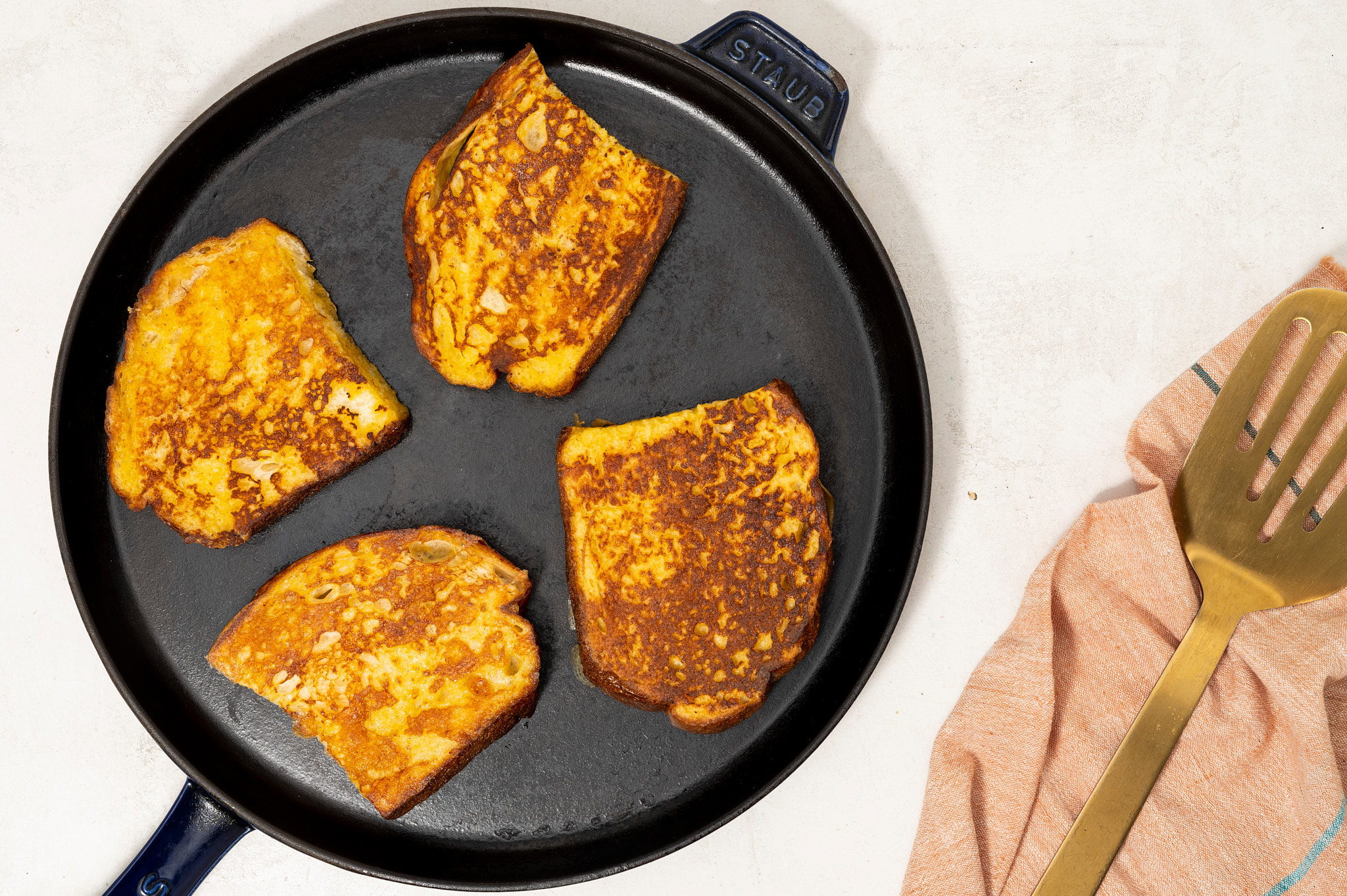 French toast cooking in a pan