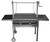Heavy-duty stainless steel Argentine barbecue grill with raised adjustable grate system and dual side shelves.