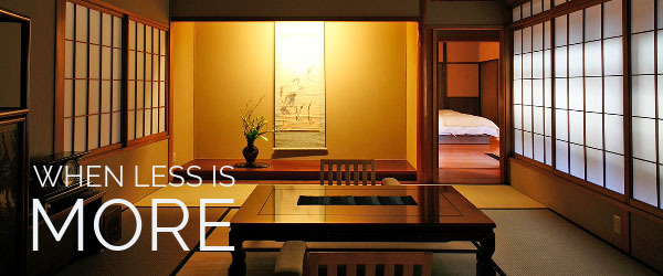 Traditional Japanese tatami room with shoji screens, low table, and minimalist decor embodying the concept of ma.