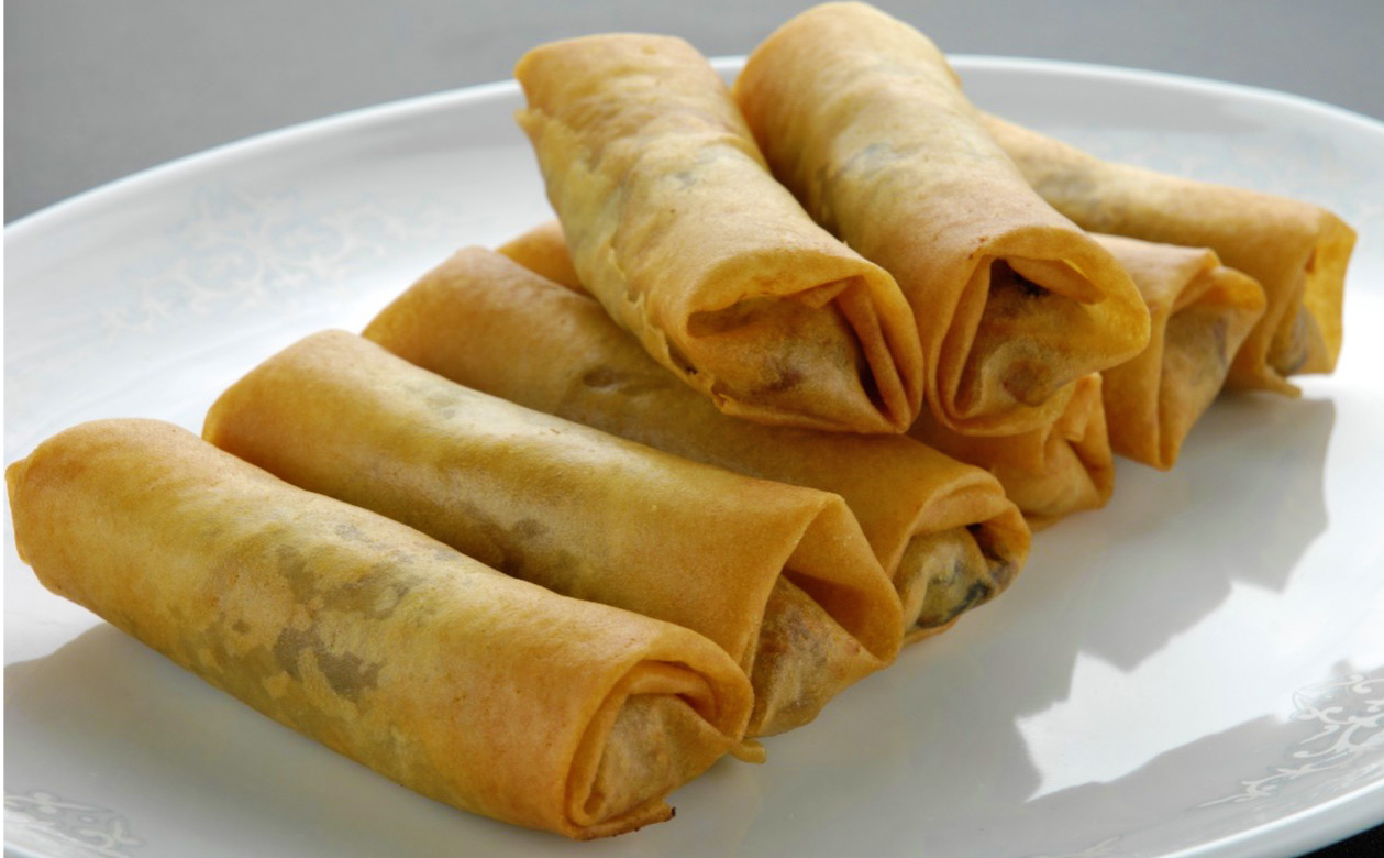 Japanese Harumaki spring rolls on a white plate