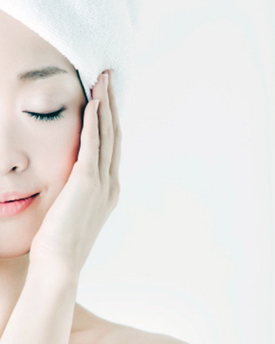 Japanese woman caring for her skin
