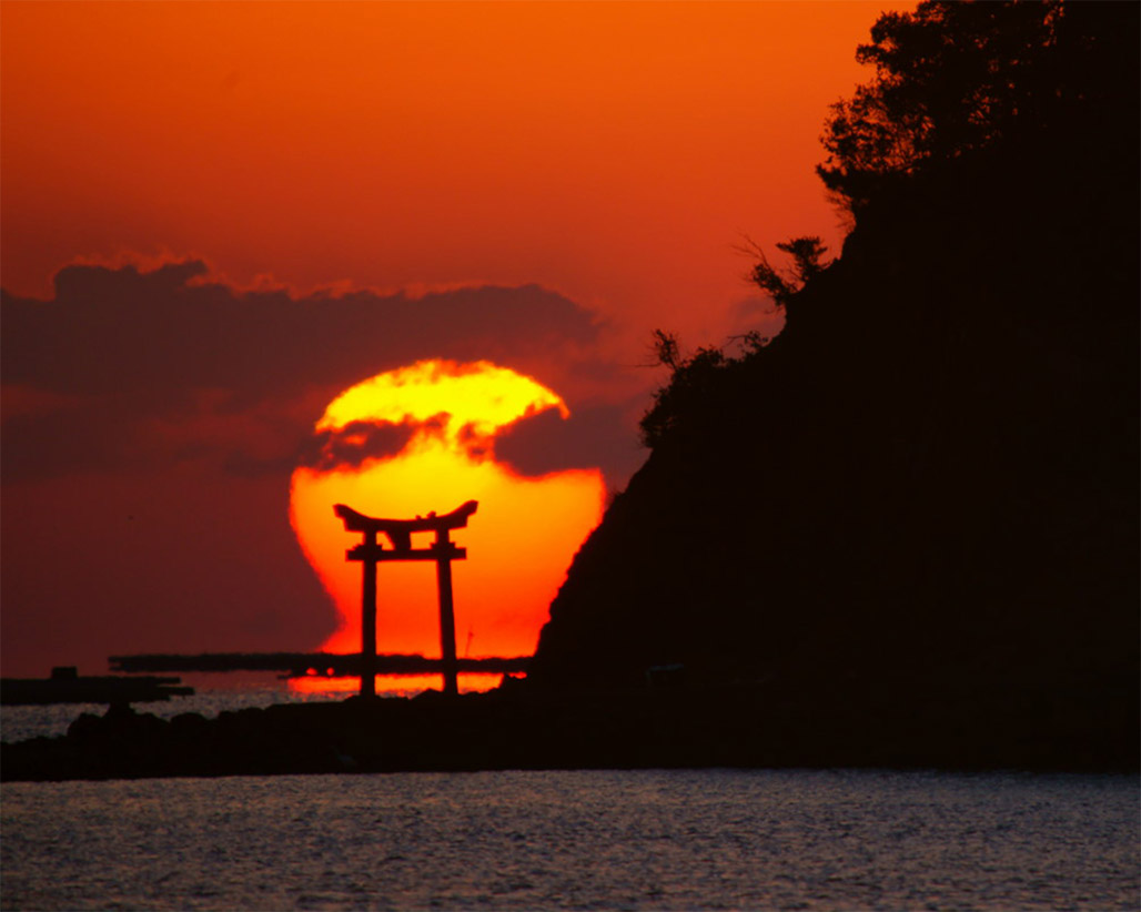 Sunrise over torii 