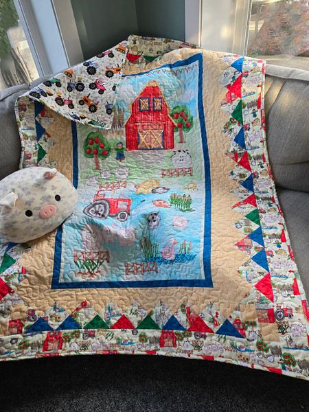 Old MacDonald Had a Farm, EIEIO!  On The Farm "Quilt Sew Easy" Pre-Cut Quilt Kit includes fabrics from ""A Trip to the Farm" by Studio e Fabrics.  This delightful collection features many of the farm animals you'd find on a farm, including sheep, pigs, ducks, cows, and the family dog, making this the perfect quilt for toddlers who are learning their sounds and animals! The kit comes complete with pre-cut fabrics, batting and backing.  This easy baby quilt kit not only saves on pre-time but is perfect for beginner quilters. Old MacDonald Had a Farm, EIEIO!  On The Farm "Quilt Sew Easy" Pre-Cut Quilt Kit includes fabrics from ""A Trip to the Farm" by Studio e Fabrics.  This delightful collection features many of the farm animals you'd find on a farm, including sheep, pigs, ducks, cows, and the family dog, making this the perfect quilt for toddlers who are learning their sounds and animals! The kit comes complete with pre-cut fabrics, batting and backing.  This easy baby quilt kit not only saves on pre-time but is perfect for beginner quilters.