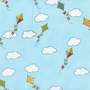 Colorful Kites Flying in the Clouds on Sky Blue