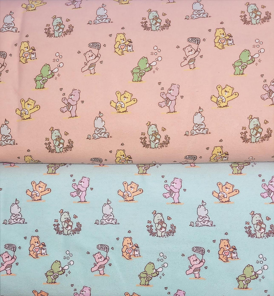 Care Bears Chasing Butterflies on Aqua Flannel