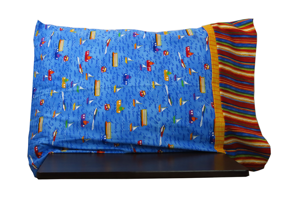 This pillowcase includes a variety of boats and ships on a blue water.  We've added a bold striped flange with picks up the bright colors in the main fabric, and added a bright orange flange. This pillowcase includes a variety of boats and ships on a blue water.  We've added a bold striped flange with picks up the bright colors in the main fabric, and added a bright orange flange.