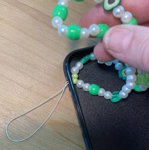 How to attach a phone charm to your case in 4 easy steps