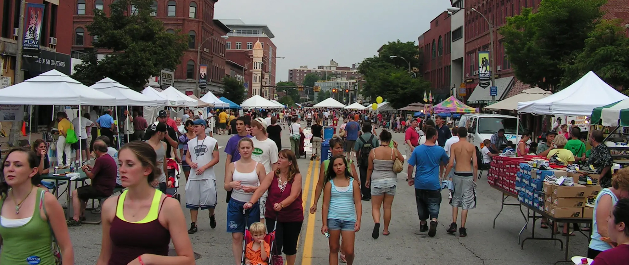 People wearing Birkenstock sandals during summer in downtown Concord, New Hampshire