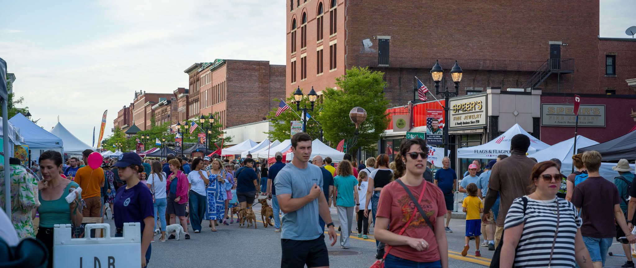 Why Birkenstocks Are a New Hampshire Summer Staple People wearing Birkenstock sandals during summer in downtown Concord, New Hampshire