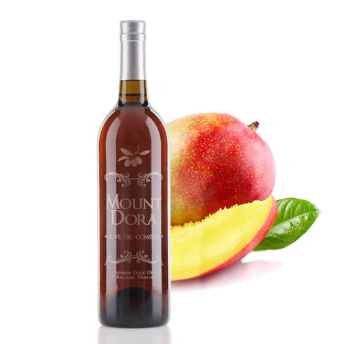 A 750mL bottle of Mount Dora Olive Oil Company Alfoos Mango White Balsamic Vinegar