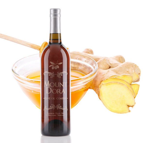 A 750mL bottle of Mount Dora Olive Oil Company Honey Ginger White Balsamic Vinegar