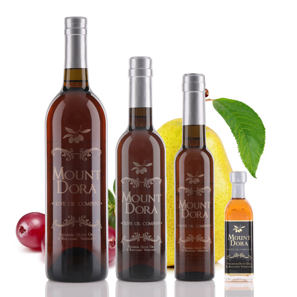 A 750mL bottle of Mount Dora Olive Oil Company Cranberry Pear White Balsamic Vinegar
