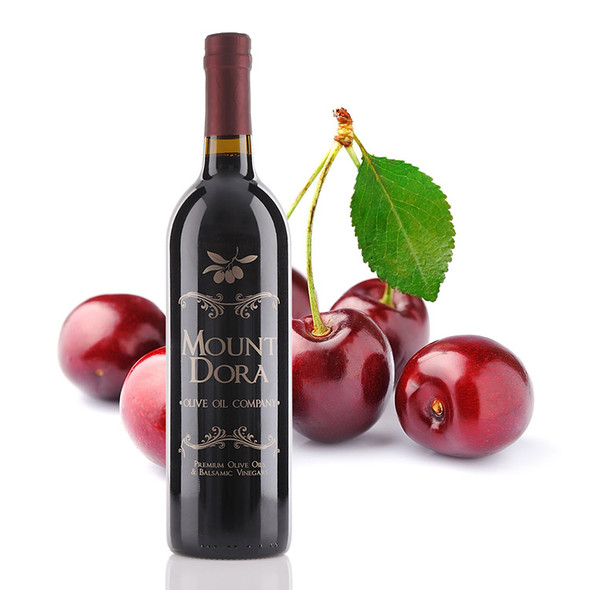 One 75oml size bottle of Mount Dora Olive Oil Company Black Cherry Dark Balsamic Vinegar.