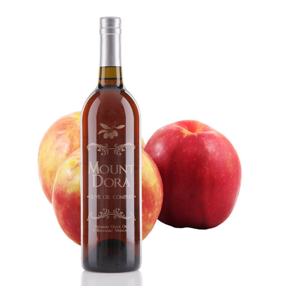 One 750ml bottle of Mount Dora Olive Oil Company Gravenstein Apple White Balsamic Vinegar.