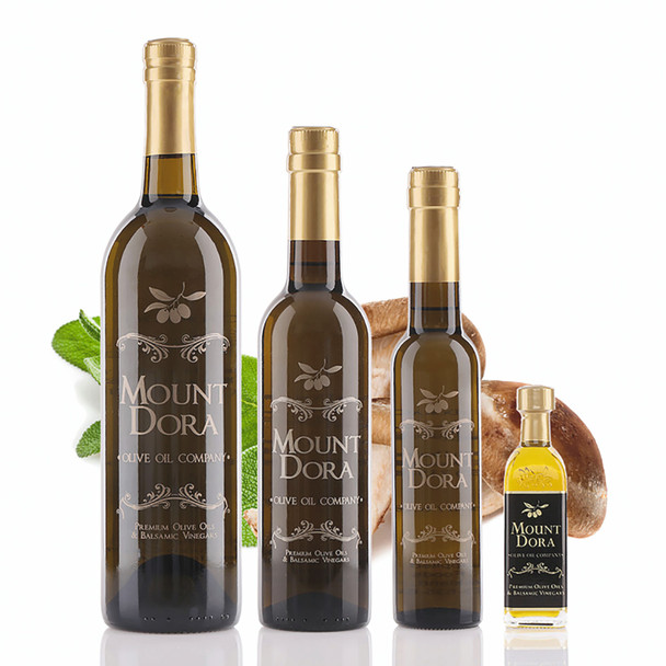 Four different size bottles of Mount Dora Wild Mushroom & Sage Infused Olive Oil