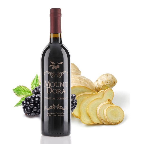 A 750mL bottle of Mount Dora Olive Oil Company Blackberry Ginger Dark Balsamic Vinegar
