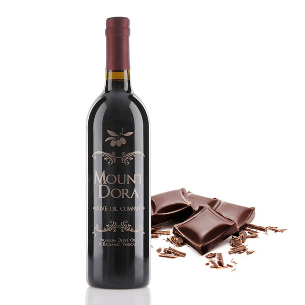 A 750mL bottle of Mount Dora Olive Oil Company Dark Chocolate Dark Balsamic Vinegar
