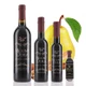 Four different size bottles of Mount Dora Olive Oil Company Cinnamon Pear Dark Balsamic Vinegar