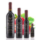 Four different size bottles of Mount Dora Olive Oil Company Strawberry Dark Balsamic Vinegar