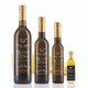 Four different size bottles of Mount Dora Butter Infused Olive Oil