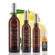 Four different size bottles of Mount Dora Olive Oil Company Grapefruit White Balsamic Vinegar.