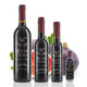 Four different size bottles of Mount Dora Olive Oil Company Black Mission Fig Dark Balsamic Vinegar