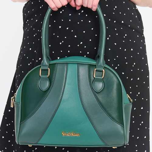 Model holding Voodoo Vixen Retro Mod Bowling Bag in Green