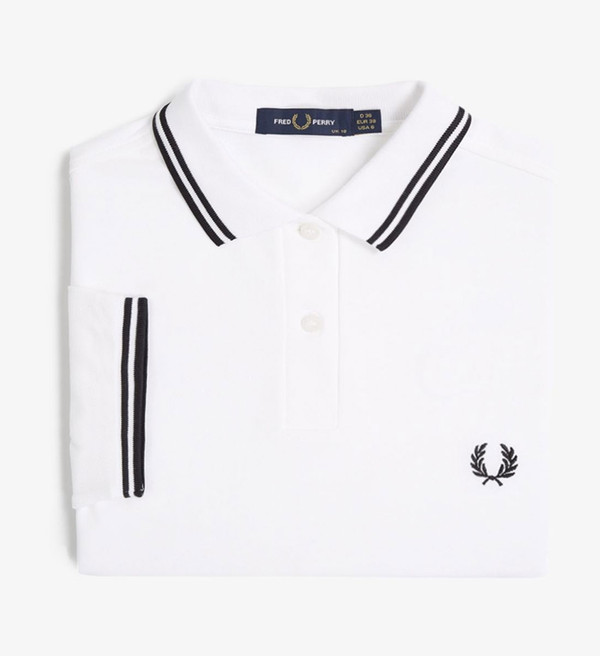 Fred Perry Women's Twin Tipped Polo Shirt in White with Black Tipping Stripes Folded