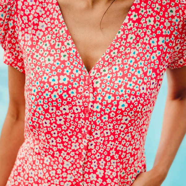 Sugarhill Brighton Retro 70s Kalisha Jumpsuit in red Rainbow Daisies