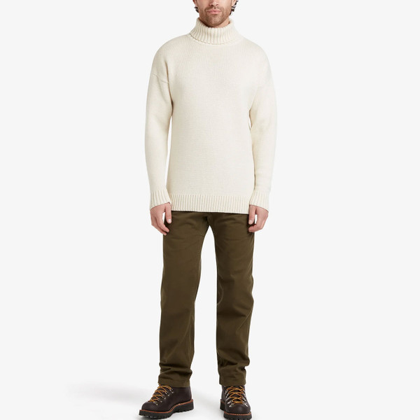 Man wearing Gloverall Submariner Retro Wool Roll Neck Jumper in Ecru