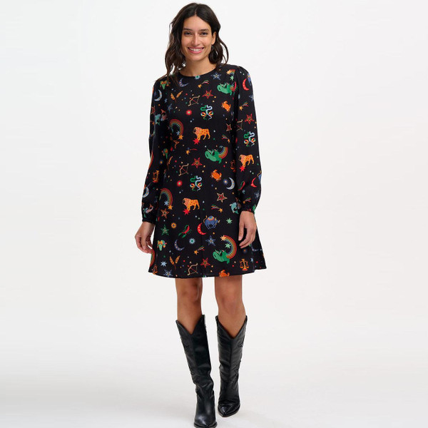 Model wearing Sugarhill Brighton Oksana Zodiac Print Mini Dress in Black D1188