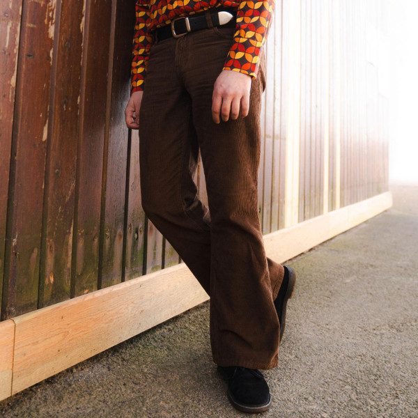 Man wearing Madcap England Men's Killer Cord Flares in Cocoa Brown MC296
