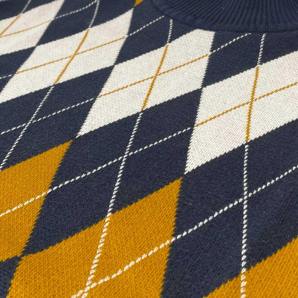 Madcap England Benmore Argyle Jacquard 1960s Mod Turtleneck Jumper in Navy Blazer MC1105