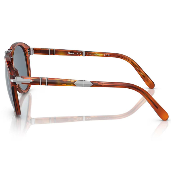Persol 714SM Steve McQueen Foldable Sunglasses in Terra Di Siena and Light Blue Lens Persol 714SM Steve McQueen Foldable Sunglasses in Terra Di Siena and Light Blue Lens