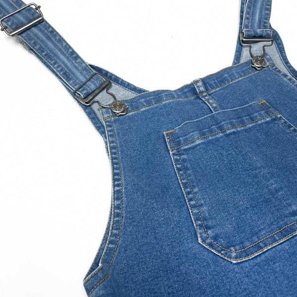 Rivet hook fastening on Madcap England Women's 70s Retro Skinny Denim Dungaree Flares in Stonewash Blue