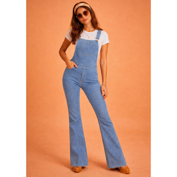 Woman wears Madcap England Women's 70s Retro Skinny Denim Dungaree Flares in Stonewash Blue