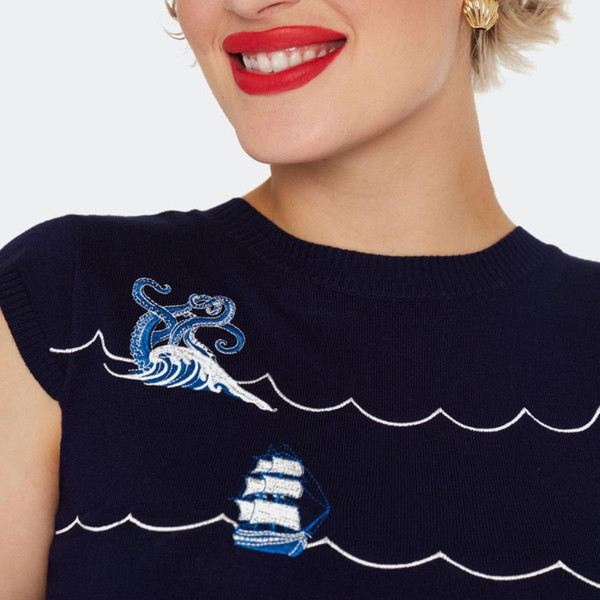 Embroidery detail on Voodoo Vixen Kraken Retro Nautical Waves Embroidered Sweater in Navy
