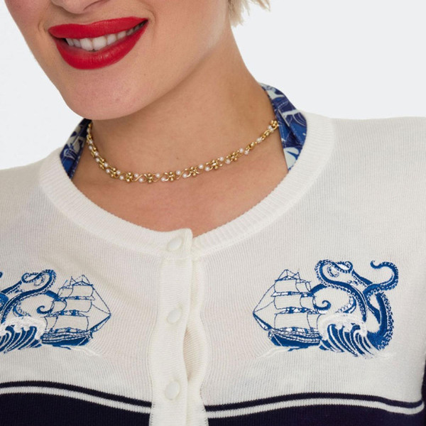 Close up on embroidery on Voodoo Vixen Nautical Wave Kraken Embroidered Cardigan in Navy/White