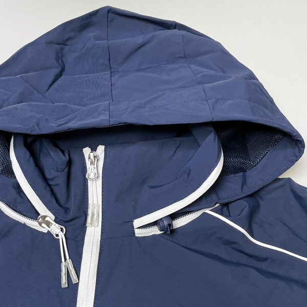 Close up on hood on Ellesse mens Gandini Live Forever Festival jacket in Navy