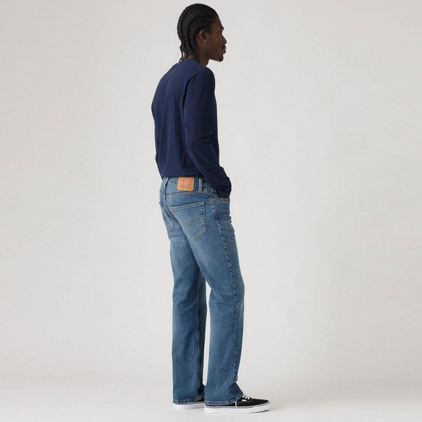 Levi's 527 Slim Bootcut Denim Jeans in Blue Tunes Model Photo Side View