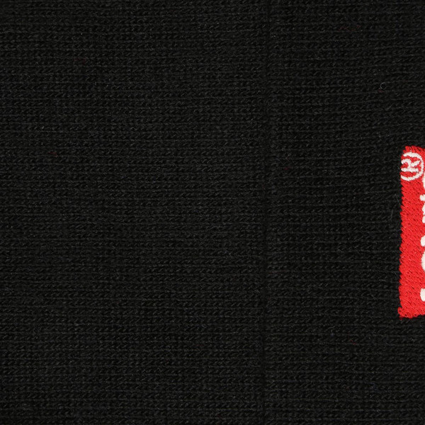 Levi's Retro Embroidered Batwing Knitted Beanie Hat in Black Close Up on Red Tab