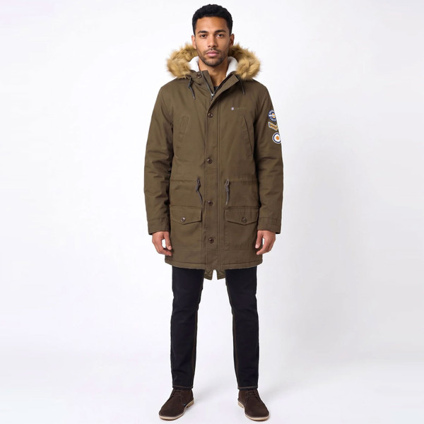 Man wearing Lambretta Mod Sherpa Lined Hooded Fishtail Parka in Khaki Green