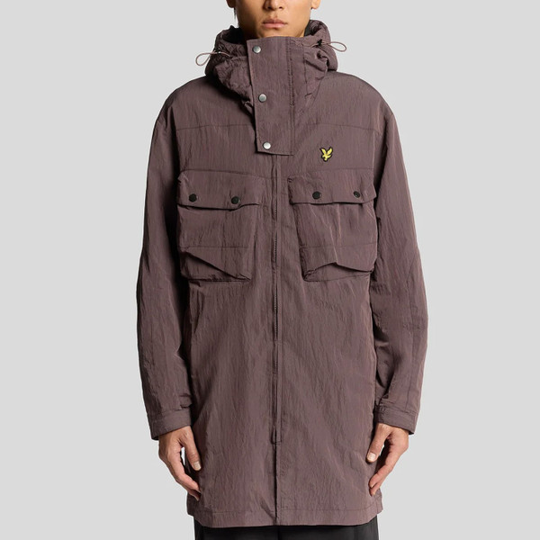 Man wearing Lyle & Scott Mens water resistant hooded Guard Parka Jacket in Espresso Brown