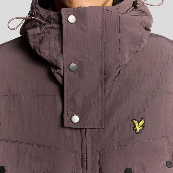 Collar and storm guard on Lyle & Scott Mens water resistant hooded Guard Parka Jacket in Espresso Brown