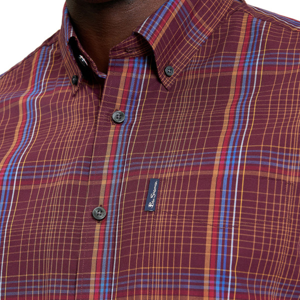 Close up of the check pattern on the Ben Sherman Men's Mod Linear Check Short Sleeve Button Down Shirt in Dark Wine