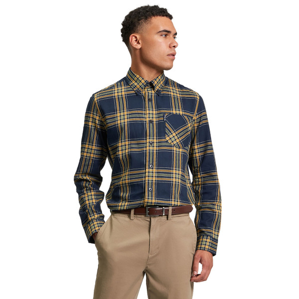 Picture of model wearing the Ben Sherman Men's Mod Button Down Long Sleeve Grid Check Shirt in Navy front view