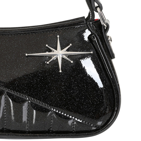 Close up on 50s Atomic Star badge on Banned Apparel Starlit Shimmer Retro 50s Handbag in Black BG34537