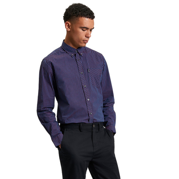 Picture of model wearing the Ben Sherman Men's Mod Button Down Gingham Shirt in Red 1012492 550 hands in pockets